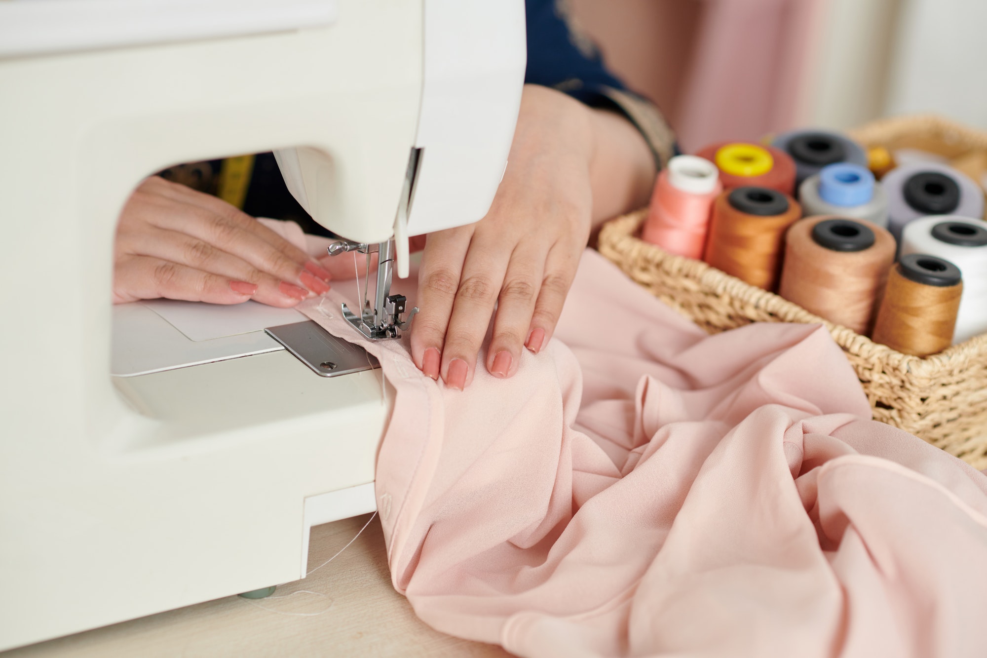 dressmaker-sewing-silk-blouse.jpg